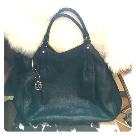 Authentic Gucci Sukey on black leather