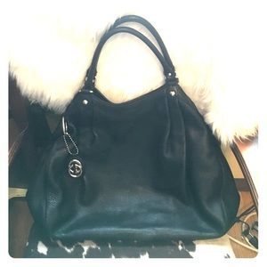 Authentic Gucci Sukey on black leather