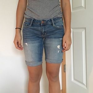 a pair of knee length shorts