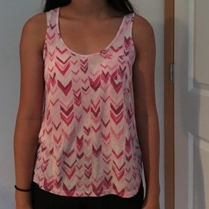 a chevron patterned pink tank top