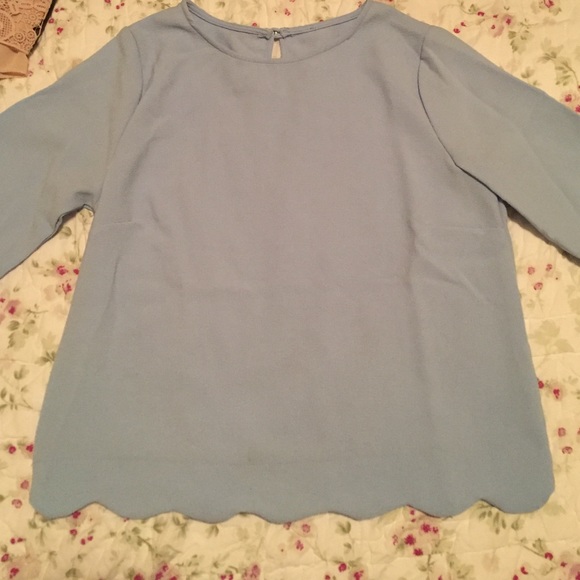 Light blue scalloped blouse