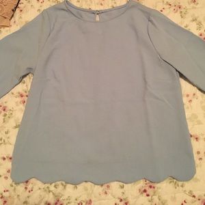 Light blue scalloped blouse