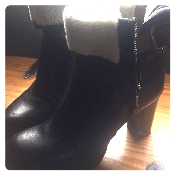 Burberry Short leather side zipper boots.