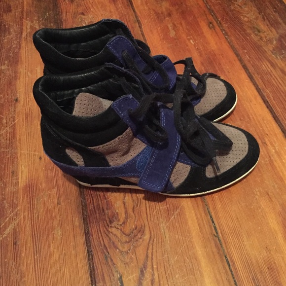 Sneakers with built in wedge