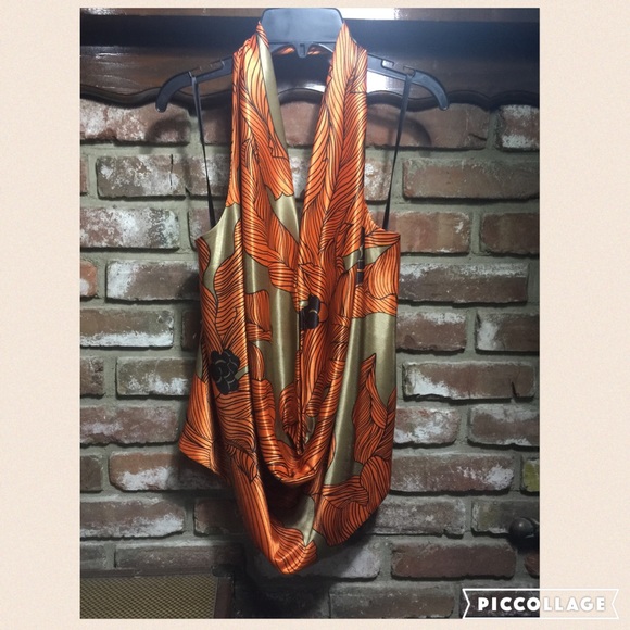 Orange abstract floral print halter top