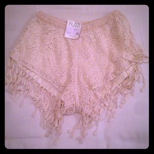 Loose fitted fringe shorts.