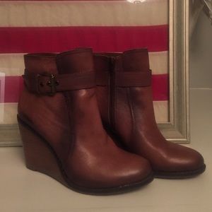 Brown leather wood wedge bootie.