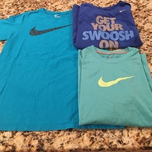 3 barley used Nike shirts