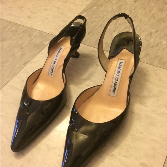 Black, paten leather Manolo Blahnik  slingbacks.