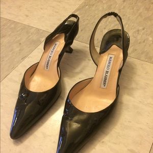 Black, paten leather Manolo Blahnik  slingbacks.