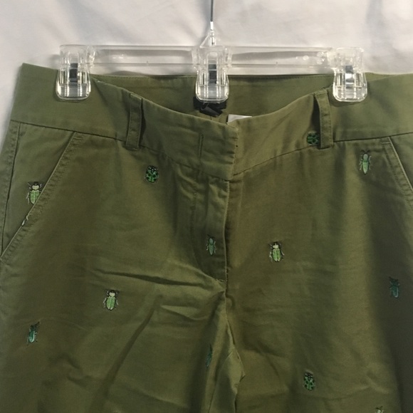 Pants with embroidered bugs