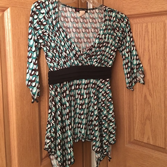 Green and brown print blouse.