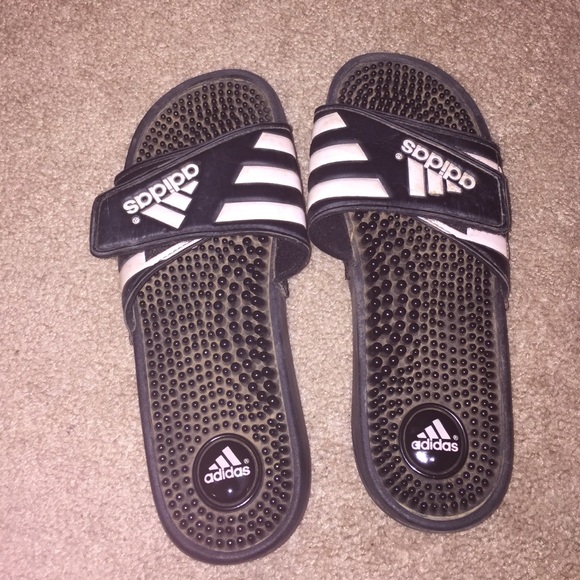 Black and Pink Adidas slippers.