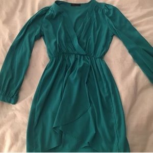 Gorgeous emerald green long sleeve faux wrap dress