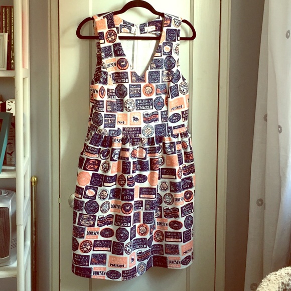 Pink and blue travel print fit and flare dress