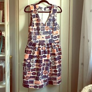 Pink and blue travel print fit and flare dress