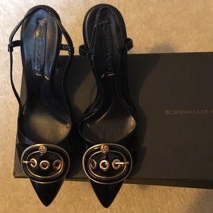 BCBG max Azria grommet sling backs