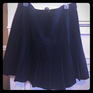 Pleated skirt. High waisted