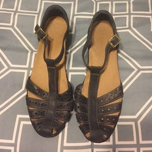 Navy closed toe Clark sandals