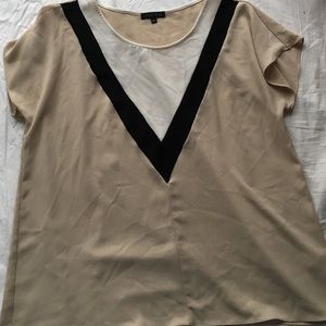 Tan cream and black blouse