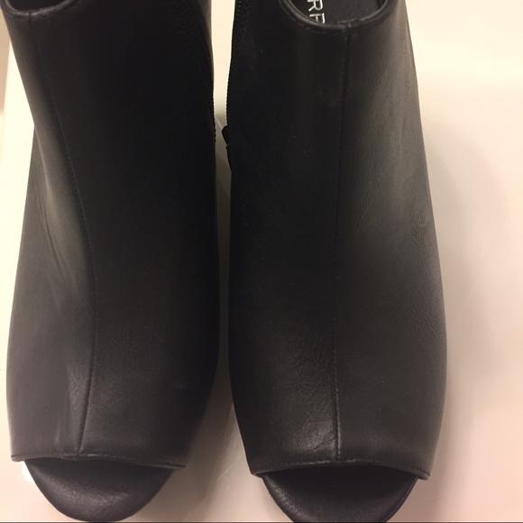 Torrid black wedge booties with peek-a-boo toe. 9