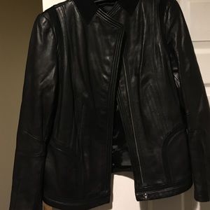 A leather jacket with suede trim.
