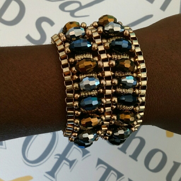 Jaw Dropping gold tone bracelet