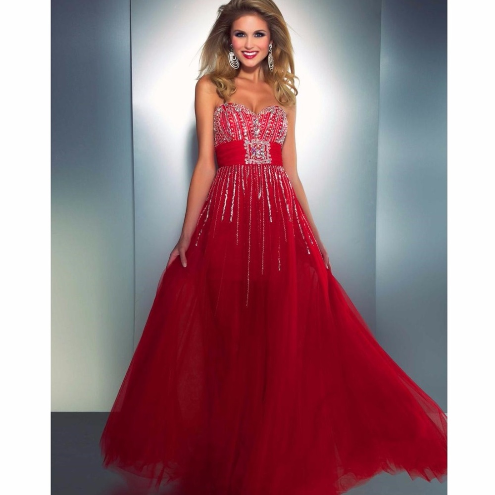 Sizzling strapless, sheer skirt by Cassandra Stone