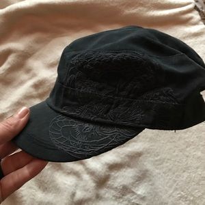 Women's b-ball hat with black dragon.