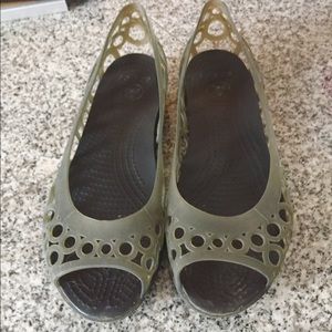 Gray and black Crocs "jellies"