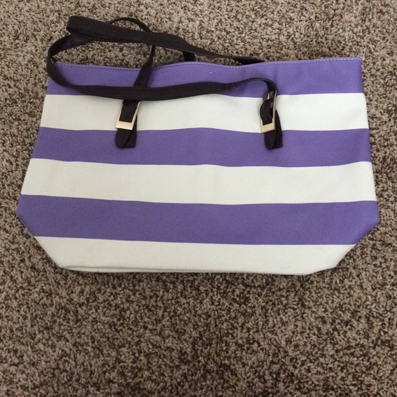 Name brand purple and white striped purse