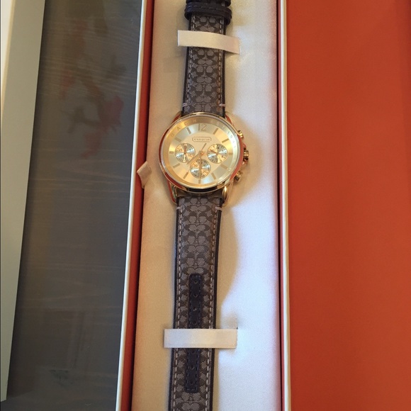 Coach watch yellow gold / brown band