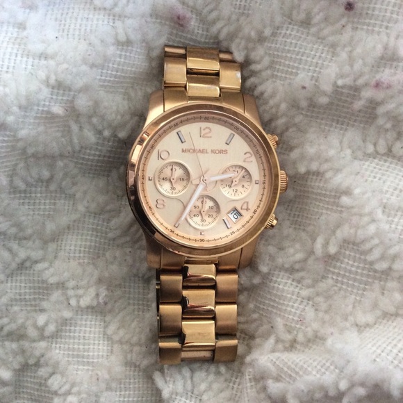 MK rose gold watch