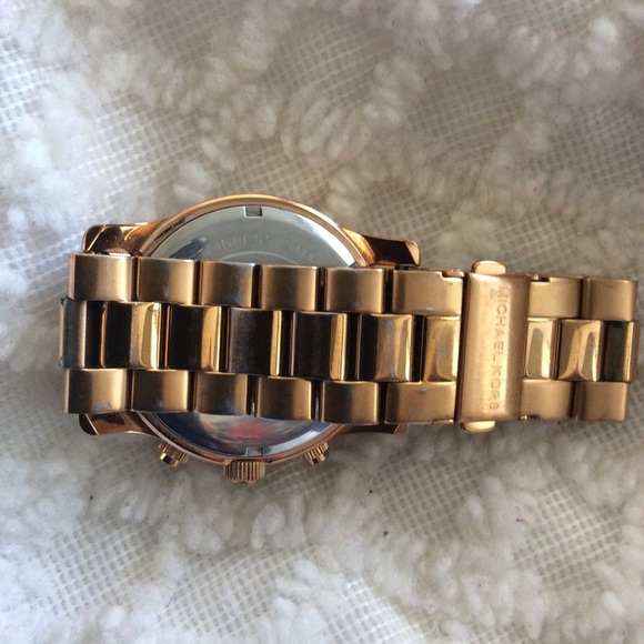 MK rose gold watch