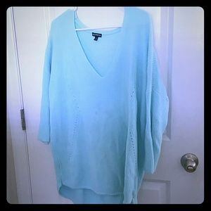 Blue/teal oversized sweater.