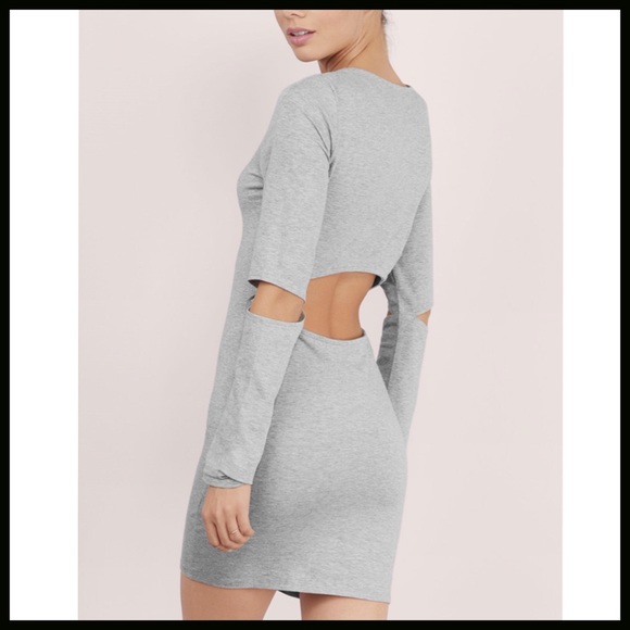 boutique Dresses & Skirts - SUPER CUTE CUT OUT BODY-CON