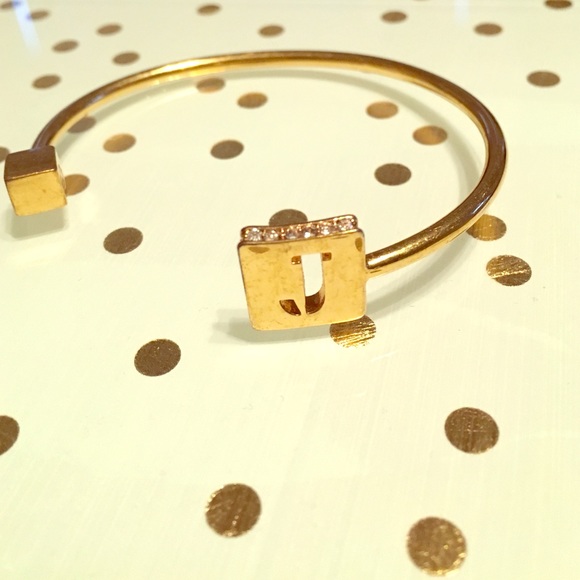 C. Wonder "J" gold cuff