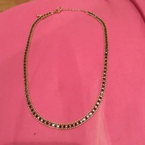 Short Gold necklace with black stones