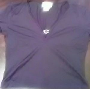 Versace low cut vneck with emblem attached.