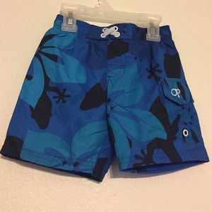 Baby boy Hawaiian flower blue swim trunks