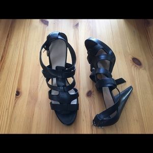 Nine West leather strappy high heeled sandals.