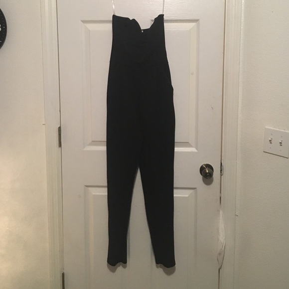Black jumpsuit with deep plunge