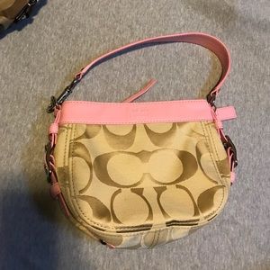Women's pink mini Coach purse