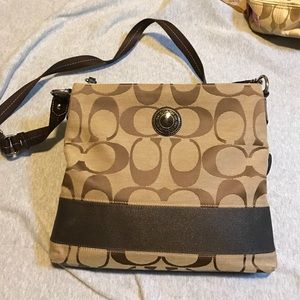 Women's brown Coach cross body bag