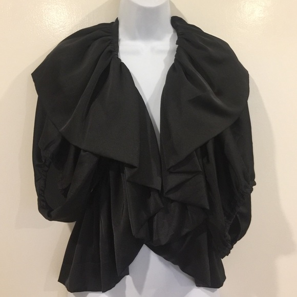 Cape/ jacket, very elegant on top of a dress.