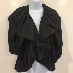 Cape/ jacket, very elegant on top of a dress.