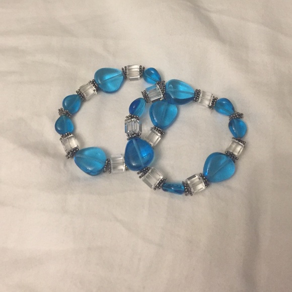 Set of two stretchy clear and blue stone bracelets