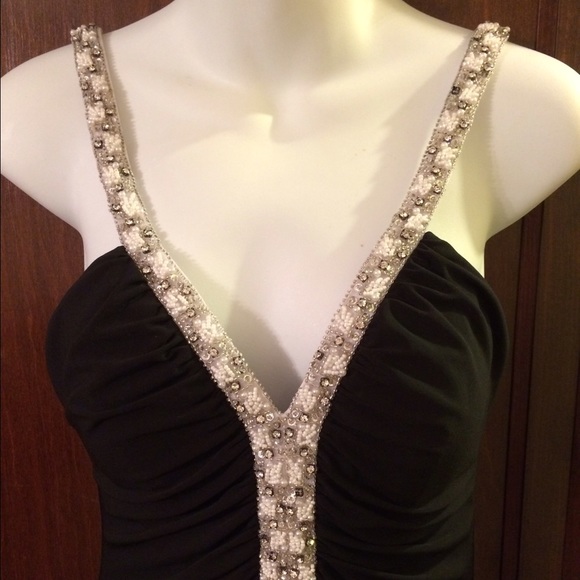 Formal black dress with white and silver beading.