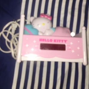 A hello kitty alarm/radio/clock