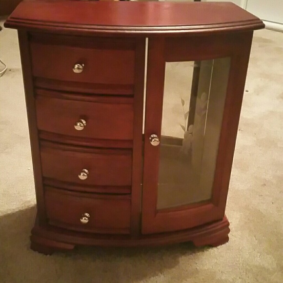 A burgundy jewelry box